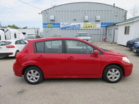 All our listed prices are cash price plus tax. 2010 Nissan Versa SL comes with Cloth Interior, Tract... (image 3)