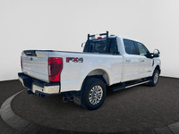 Looking for towing power and a truck that packs a punch? This WHITE Ford Super Duty pickups offer a... (image 4)