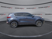 This Kia Sportage has a powerful Regular Unleaded I-4 2.4 L/144 engine powering this Automatic trans... (image 8)
