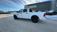 This Ram 1500 Classic is equipped with: Cloth Front 40/20/40 Bench Seat, Front 40/20/40 Split Bench... (image 5)