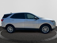 Offering excellent driving manners, this Chevrolet Equinox is SILVER in color and is equipped with a... (image 5)
