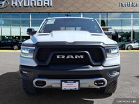 Command the road in this 2024 Ram 1500 Rebel Crew Cab, a head-turning powerhouse boasting a robust 5... (image 7)