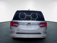 Meet the 2019 Honda Odyssey EX-L RES, a silver front-wheel-drive van that promises a smooth journey... (image 5)