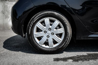 This 2021 Kia Rio 5-door is for sale today. This hatchback has 79,868 kms. It's black in colour . It... (image 5)