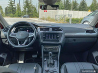This Volkswagen Tiguan boasts a Intercooled Turbo Regular Unleaded I-4 2.0 L/121 engine powering thi... (image 9)