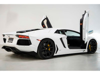 This Powerful 2012 Lamborghini Aventador LP 700-4 epitomizes the pinnacle of automotive engineering,... (image 4)