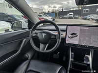 This Tesla Model Y boasts a Electric engine powering this Automatic transmission. Window Grid Antenn... (image 8)