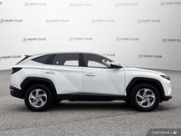 This 2022 Hyundai Tucson Essential SUV boasts a stunning Crystal White exterior and a sleek black cl... (image 7)