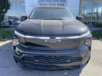 The 2024 Chevrolet Silverado EV RST in Black is a powerful and innovative electric pickup truck. Its... (image 1)