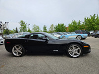 This isn’t just a car—it’s a statement. Draped in sleek black-on-black with polished chrome wheels t... (image 8)