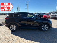 This Kia Sportage LX, with a 4 Cylinder Engine, features a Auto transmission. Find this vehicle with... (image 8)