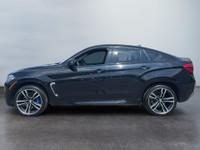 Alliant puissance, prestige et performance, ce BMW X6 M 2017 noir incarne l’exclusivite du savoir-fa... (image 2)