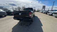 This 2024 RAM 1500 TRADESMAN CREW CAB 4X4 has the following options Cloth 40/20/40 Bench Seat, Uconn... (image 7)
