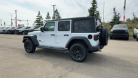 This 2025 JEEP WRANGLER 4-DOOR SPORT has the following options Cloth Low-Back Bucket Seats, Uconnect... (image 6)