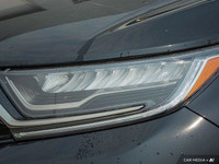 This Honda CR-V delivers a Intercooled Turbo Regular Unleaded I-4 1.5 L/91 engine powering this Vari... (image 9)