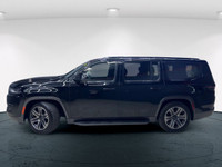 The 2022 Jeep Wagoneer Series III 4x4 in elegant black promises a powerful and confident drive with... (image 1)