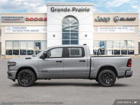 This Ram 1500 boasts a Gas/Electric V-6 3.6 L/220 engine powering this Automatic transmission. Cruis... (image 3)