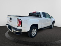 The GMC Canyon can carry up to 1620 pounds of people or cargo, and tow up to 7,000 pounds. White in... (image 4)