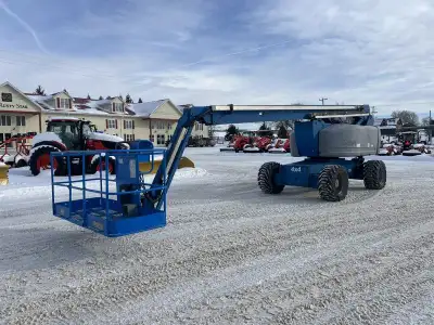 Articulating man lift, 2012 Genie model Z80/60. This boom lift has a platform height of 78 feet givi...