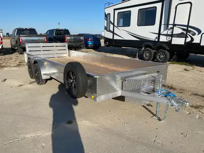 7000lbs GVWR, empty weight 1620lbs, all aluminum frame, 15" side height, tandem 3500lbs spring idler...