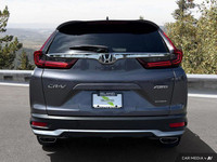 This sleek 2021 Honda CR-V Sport SUV, boasting a stunning Modern Steel Metallic exterior and only 33... (image 4)