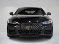 This 2021 BMW 4 Series M440i Coupe blends exhilarating performance with elegant design, featuring th... (image 5)
