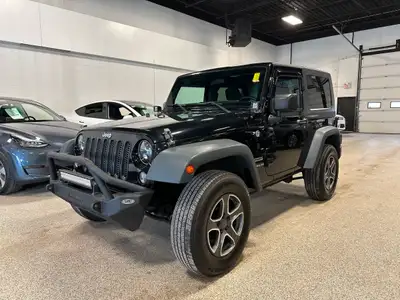 Our 2015 Jeep Wrangler Sport 4WD looks great in a Black Clearcoat. Powered by a 3.6 Litre V6 that pr...