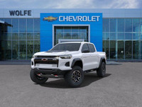 The 2025 Chevrolet Colorado ZR2, presented in Summit White with a Jet Black/Artemis interior, is eng... (image 3)