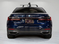 This sophisticated 2020 BMW 750i blends flagship luxury with commanding performance, finished in a d... (image 6)