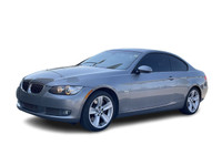 This gorgeous Space Grey over Black Dakota leather 2009 BMW 335i xDrive Coupe was traded in to us fr... (image 2)