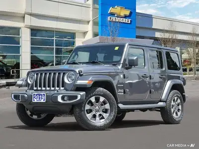 Conquer any terrain with this 2019 Jeep Wrangler Unlimited Sahara. Boasting a powerful 3.6L Pentasta...