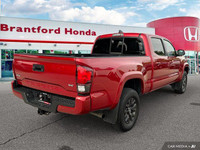 Conquer any terrain with this 2023 Toyota Tacoma Crew Cab Pickup. Its robust four-wheel-drive system... (image 5)