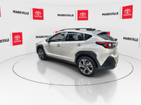 The 2024 Subaru Crosstrek Touring, particularly for the Canadian market, is a popular compact SUV th... (image 6)