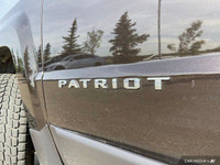 This Jeep Patriot has a strong Regular Unleaded I-4 2.0 L/122 engine powering this 5-Speed Manual tr... (image 9)