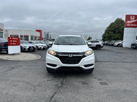 Unwind in this sleek 2018 Honda HR-V LX, boasting a pristine White Orchid Pearl exterior. With only... (image 1)