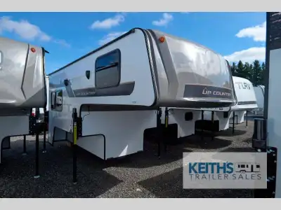 Travel Lite Up Country truck camper 850U highlights: Queen-Size Bed L-Shaped Sofa with a Table Two B...