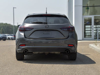 Step into the 2017 Mazda Mazda3 GS in an exquisite tan finish, complemented by its front-wheel drive... (image 5)