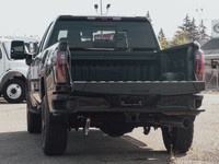 The 2025 GMC Sierra 3500 AT4 stands tall as a powerhouse of rugged sophistication, engineered to tak... (image 7)