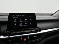 Experience refined performance and modern comfort with the 2024 Kia Forte 5 EXâ€”a sleek, sporty hat... (image 5)