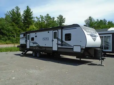This beautiful bunk model trailer has tons of sleeping and living space! It is also easy to tow with...