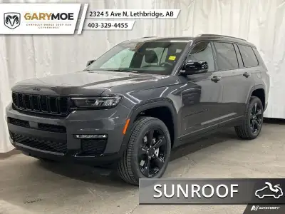 The 2025 Jeep Grand Cherokee L Limited 4x4 in sophisticated gray with its smooth 4x4 drivetrain prom...