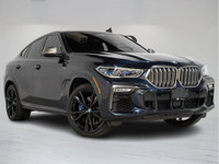 This 2020 BMW X6 M50i Coupe commands attention with aggressive styling, a powerful V8 engine, and re... (image 1)