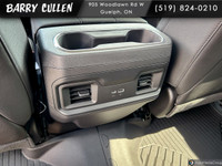 Experience the 2025 Chevrolet Silverado 1500 LT Trail Boss, an impressive black 4x4 truck designed t... (image 7)