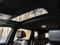 This Honda CR-V is equipped with: Leatherette/Fabric Seating Surfaces, Power moonroof, Heated front... (image 7)
