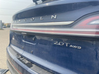 Under the glistening Rhapsody Blue exterior, the 2019 Lincoln Nautilus Reserve stands as a testament... (image 6)
