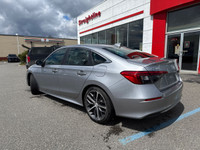The 2022 Honda Civic Sedan Touring combines sleek styling, advanced technology, and impressive perfo... (image 5)