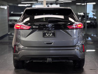 The 2022 Ford Edge ST-Line is a mid-size SUV that combines sporty styling with the practical feature... (image 3)