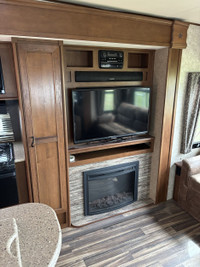 This opposing slides trailer is sure to impress anybody that walks through the door! This rear livin... (image 7)