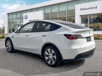 This Tesla Model Y boasts a Electric engine powering this Automatic transmission. Window Grid Antenn... (image 2)