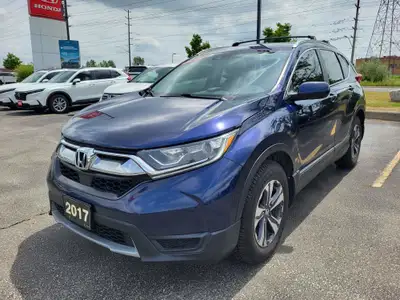 This 2017 CR-V LX comes equipped with AWD, Collision Mitigation Braking System, Forward Collision Wa...